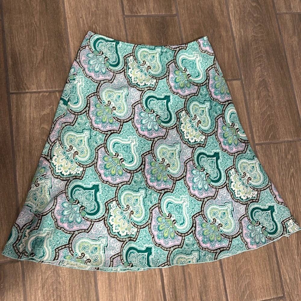 Buyer 13 California teal, brown, lavender paisley skirt. Size small.